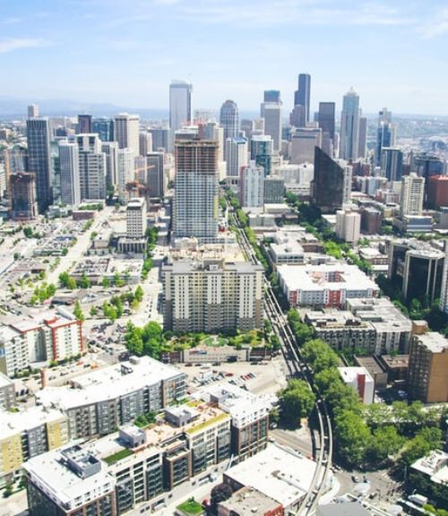 Smart green city with skyscrapers and high buildings.