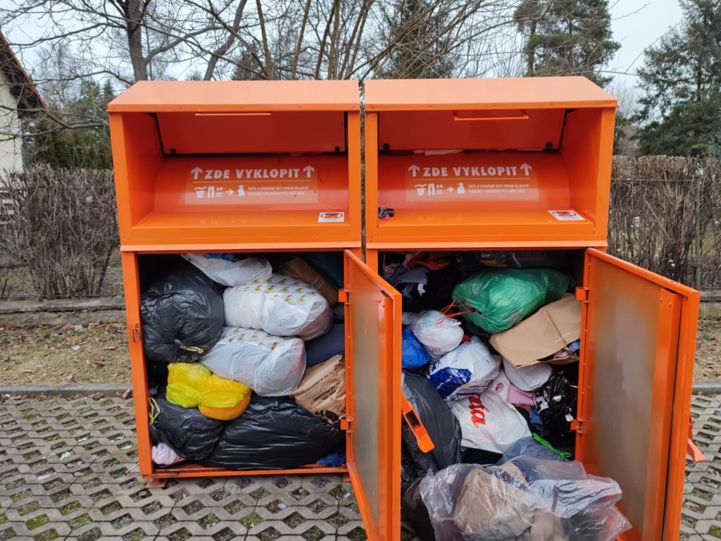 Potex container for used textile on the street.