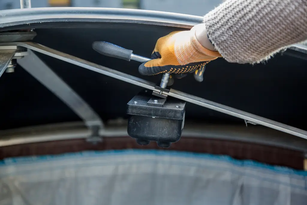 Installed sensor inside of a semi-underground bin. 