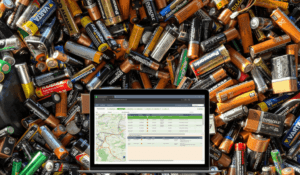 Mockup of Sensoneo software system platform for take-back system operators with many batteries in the background. 